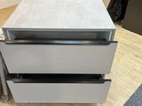 two drawers that are on top of each other