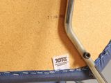 a close up of a piece of luggage with a tag on it