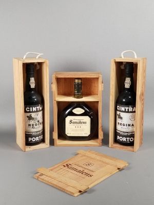 two bottles of wine in a wooden box with a corket