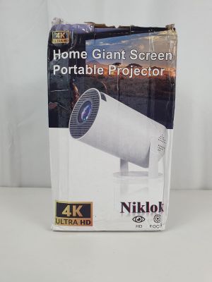 Photo du projecteur portable Nikko Home à écran géant, dans son emballage
