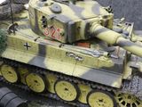 a toy tank that is sitting on the ground