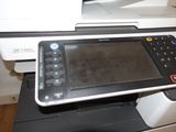 a printer that is sitting on top of a desk
