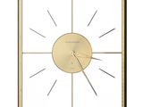 an image of a gold clock with a white background