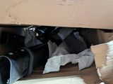 a cardboard box with a bunch of items inside of it