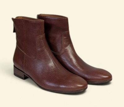brown leather ankle boots on a white background