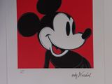 an image of a mickey mouse painting hanging on a wall