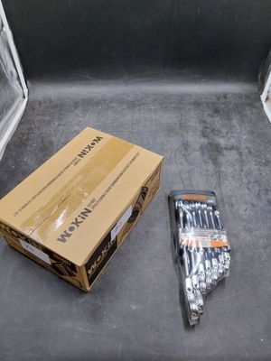 a box of screws sitting on the floor next to a box of screws