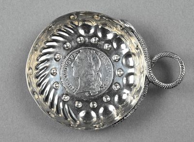 Tastevin en argent, le corps godronné centré d'une pièce d'u…