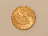an image of a gold coin on a white surface