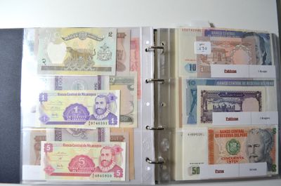 a binder with a lot of different bills in it