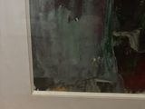 a picture of a cat that is sitting in front of a window