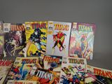 a bunch of comics sitting on top of a table next to each other