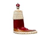a figurine of a shoe with a crown on top of it