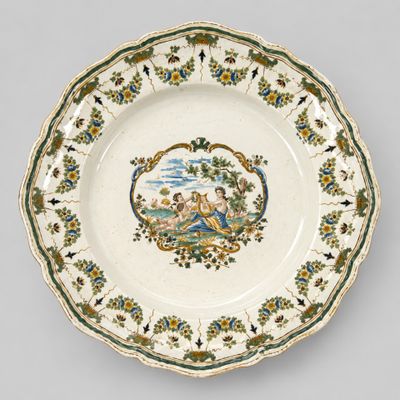 a plate with a picture of a man and a woman on it