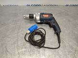 an electric drill with a cord attached to it sitting on a table