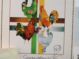 many cards with pictures of chickens and roosters on them