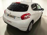 a picture of a white car parked in a showroom