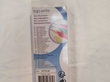 a small package of toothbrushes sitting on a white surface