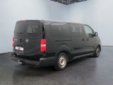 a picture of a black van parked in a room
