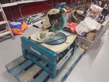 a picture of a table with a circular saw on top of it