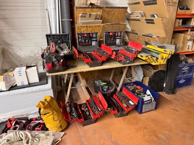 a lot of tools that are sitting on a table