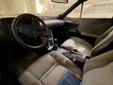 dashboard of a car with a book in the passenger seat