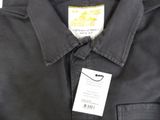 men ' s black work shirt with a tag on the collar