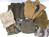 a lot of men ' s clothing on a white surface