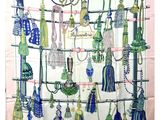 a picture of a shower curtain with a lot of tassels on it