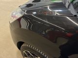 a close up of a car with a sticker on the side of it
