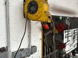 an image of a garage with tools on the wall