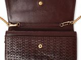 a brown leather wallet with a chain around it