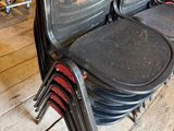 many chairs that are sitting on a wooden floor