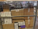 a metal cart with boxes on top of it in a warehouse