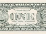 a close up of a one dollar bill on a white background