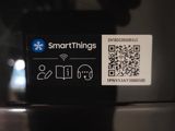 a close up of a smart phone with a qr code on it