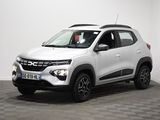 un 4x4 blanc garé dans une pièce au sol en damier