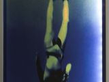a picture of a picture of a person diving in the water