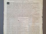 an old newspaper with a black and white image of a man on a horse