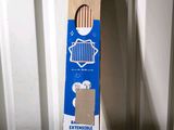 a cardboard box that has a toothbrush inside of it