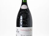 a bottle of wine that is sitting on a table