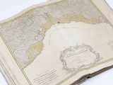 an old map of australia and new zealand on a table