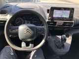 the interior of a car with a steering wheel, dashboard, and dash board
