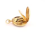 an image of a gold pocket watch on a white background