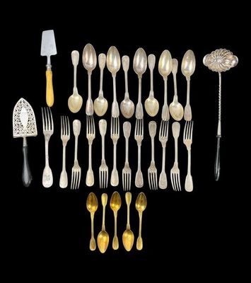 a group of silverware including forks, spoons and spatulas
