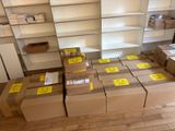 many boxes that are sitting on the floor in the room