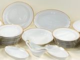 a lot of plates that are sitting on a table