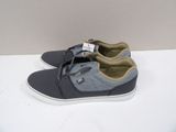 men ' s grey and grey sneakers with laces on them