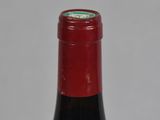 a bottle of wine that is sitting on a table