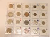 a lot of coins that are in a plastic case